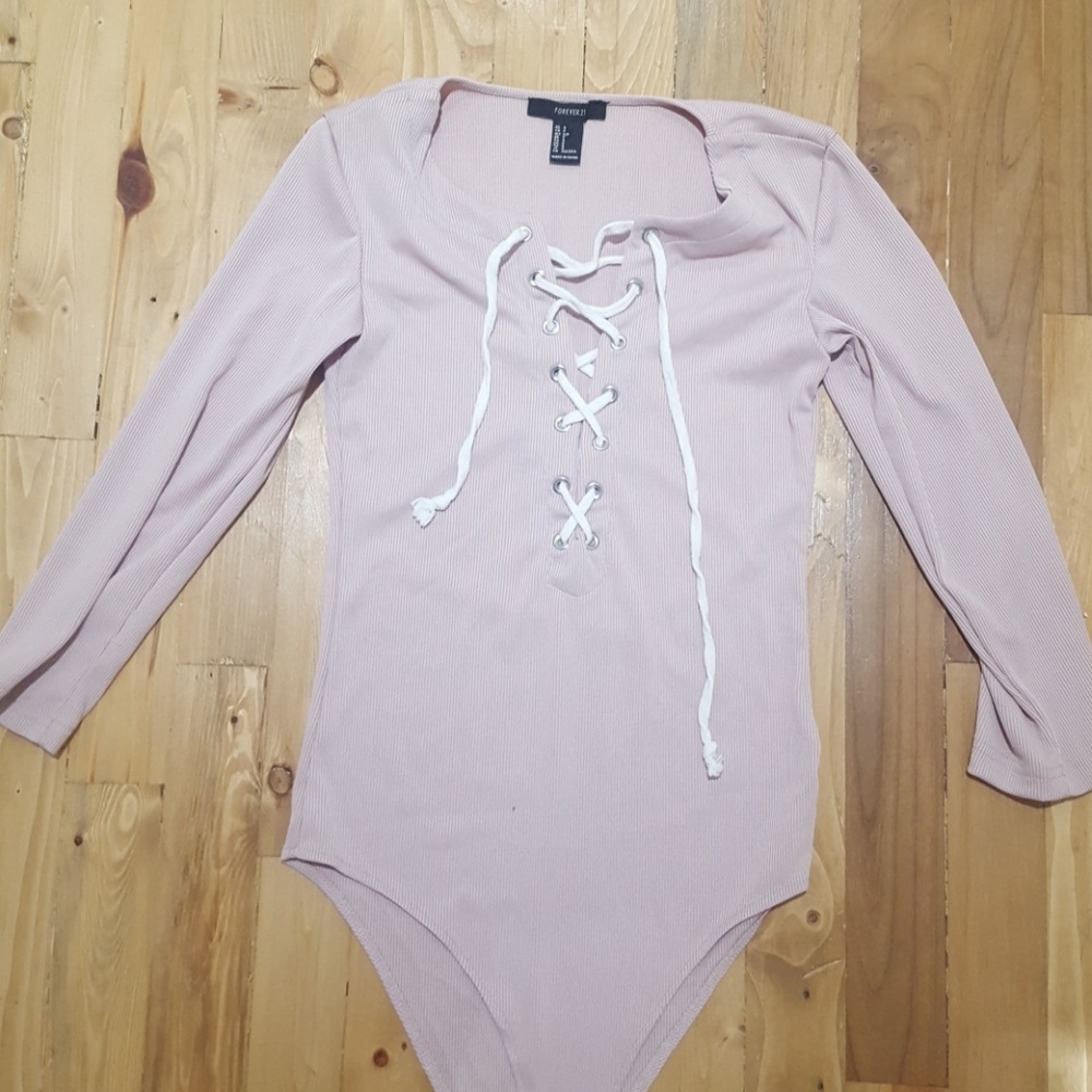 Plunging lace up long sleeve blush bodysuit
